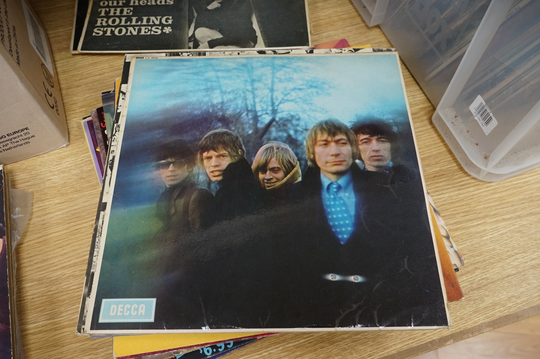 Eighteen The Rolling Stones related LP record albums, including five early pressings on Decca label; Rolling Stones, Rolling Stones No.2, Out of Our Heads, Aftermath, and Between the Buttons, together with; Exile on Main